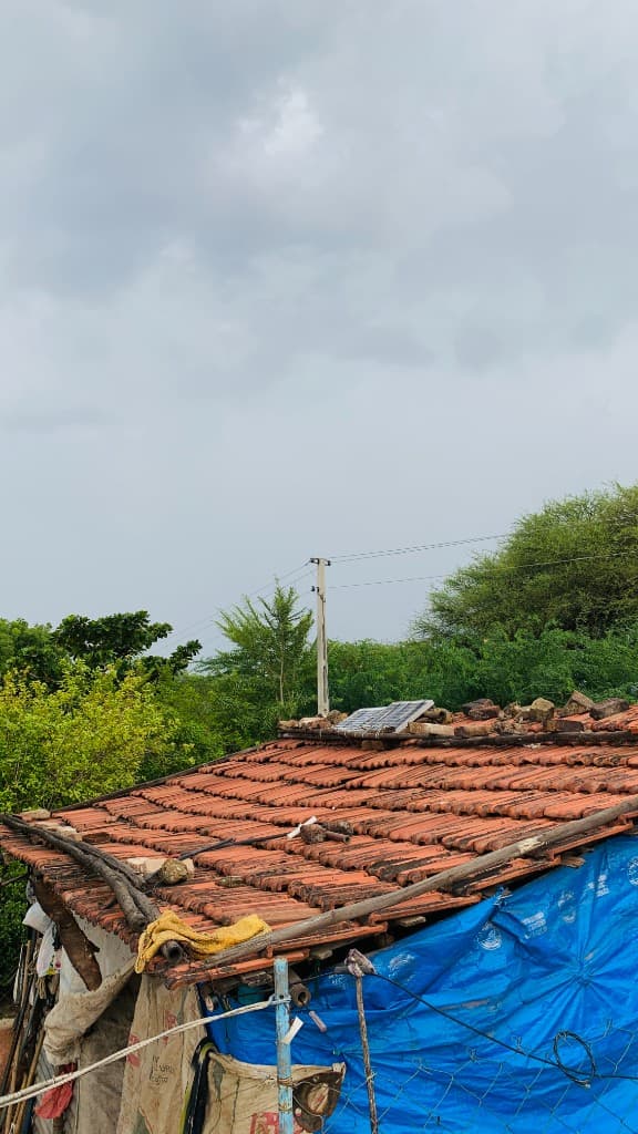 Solar panel on a rustic clay tile roof